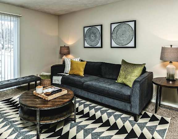 a living room with a couch and a table