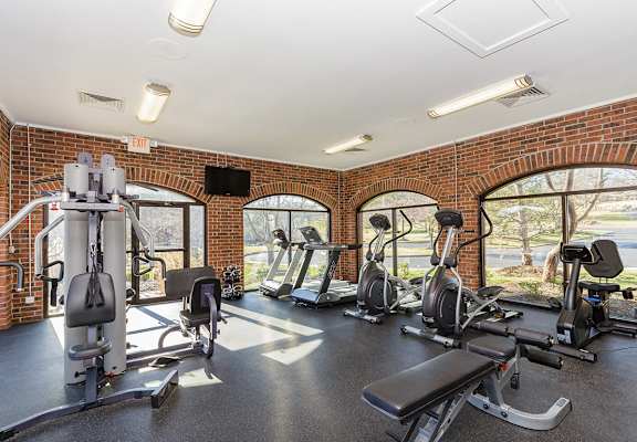 Modern gym at Reflection Cove Apartments, Manchester, MO, 63021