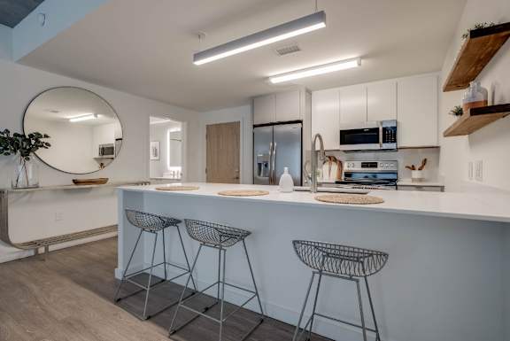 Kitchen with Counter and Bar Stools at an Art Museum at The Locks Tower in Richmond, Virginia