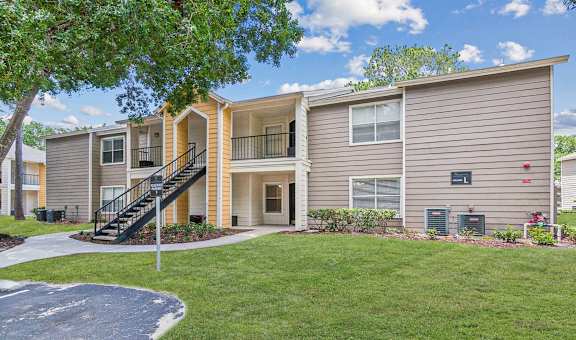 our apartments feature a spacious courtyard with a tree