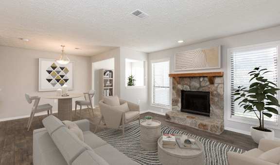 a living room with a fireplace and a table and chairs at Edgemont Apartments, PRG Real Estate, Greenville, 29615