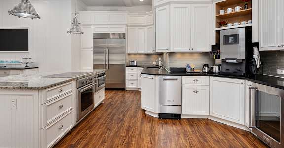 Clubhouse kitchen with coffee bar at The Reserve at Mayfaire Apartments, Wilmington, NC