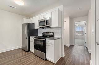 Kitchen with stainless steel appliances at Eagle Ridge Apartment Homes, Traverse City, Michigan