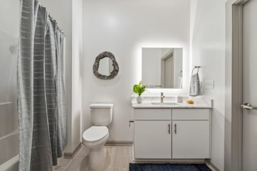 Bathroom with a White Sink At Rocketts Landing Apartments, PRG Real Estate, Richmond, Virginia