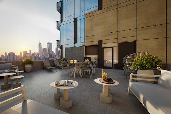 a basketball court in the middle of a gym with a ball on it at SKY Apartments, New York