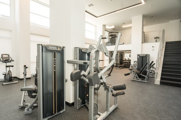 a gym with a lot of exercise equipment at East 51 At Rocketts Landing, Richmond, 23231