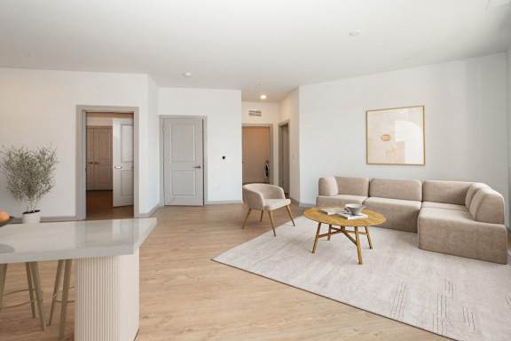 a living room with a couch and a table
