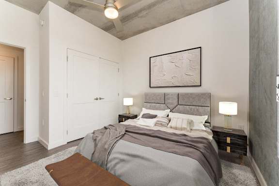 a bedroom with a bed and a ceiling fan at South Falls Tower, Richmond, VA, 23224