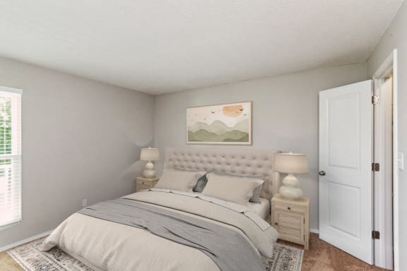 a bedroom with a bed and a door to a closet