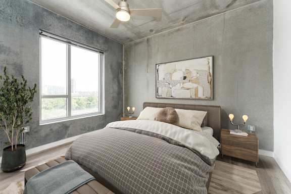 a bedroom with a bed and a large window at South Falls Tower, Richmond, VA, 23224