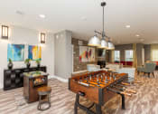 Thumbnail 15 of 30 - Foosball table in Proximity’s community area at Proximity Apartments, Charleston