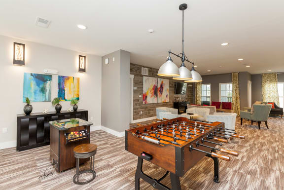 Foosball table in Proximity’s community area at Proximity Apartments, Charleston