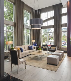 a living room filled with furniture and a large window at Heights at Glen Mills, Glen Mills, Pennsylvania