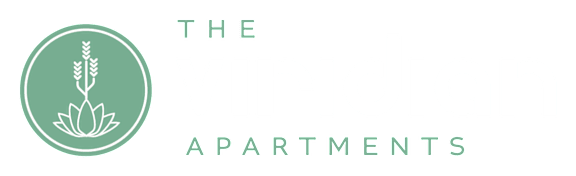 The Viridian Apartments logo with a plant inside a circle.