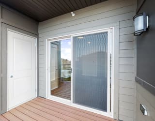 In the Marigold with den floor plan, enjoy the view from your spacious and patio.