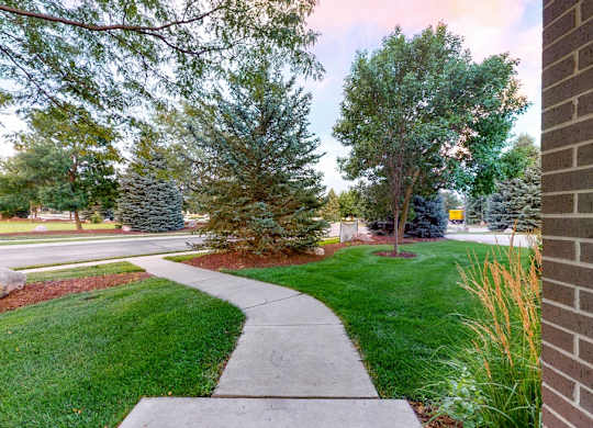 You'll love manicured landscape view from your private entrance of this two bedroom Cedar floor plan.
