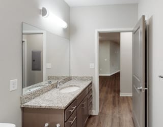 The 2 bedroom Hibiscus floor plan features a spacious bathroom with granite vanity top and a tub/shower.