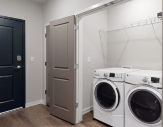 A washer and dryer are included in the 2 bedroom Hibiscus floor plan at WH Flats