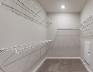 You'll love the large walk-in closet in the master bedroom in the Hibiscus floor plan.