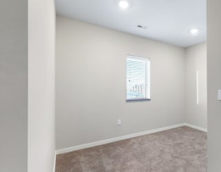 The den area in the 2 bedroom Marigold with den floor plan is perfect for a desk or reading nook.