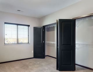 The 2 bedroom Snowdrop with den floor plan features incredibly spacious closets with abundant storage.