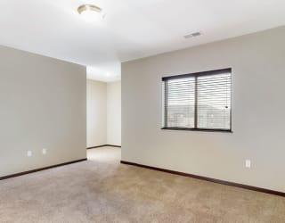 The large bedroom with den area in the 2 bedroom Snowdrop with den floor plan is perfect for a desk or reading nook.
