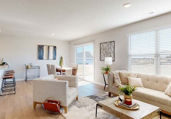 a living room with a couch and a table
