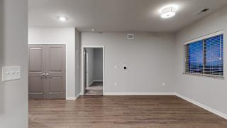 The 2 bedroom Hibiscus floor plan at WH Flats features natural light and a spacious living and dining area.