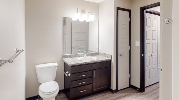 Renovated bathroom with linen storage closet at Northridge Heights Apartments
