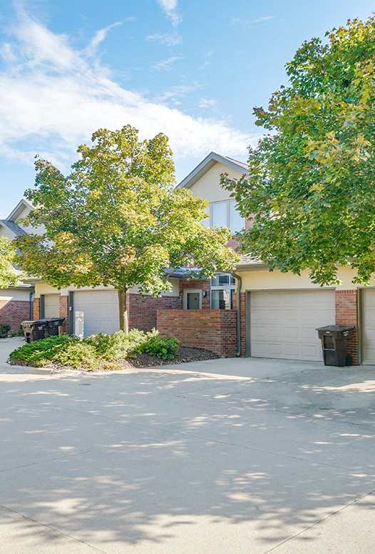 Cozy fireplace and hardwood-style flooring at Southwind Villas in La Vista NE