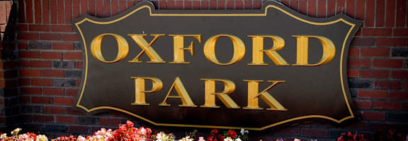 Property Sign at Oxford Park Apartments, Fresno