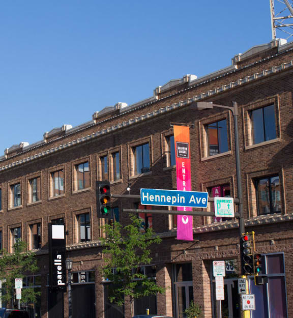 A street view of a city with buildings, traffic lights and signs. at Park Towers, Minnesota, 55416