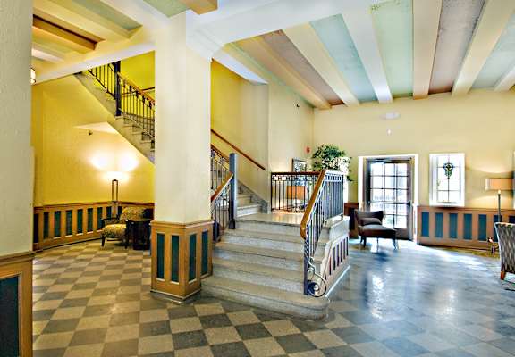 Lobby and staircase at The Ambassador at Library Square, Indianapolis, IN