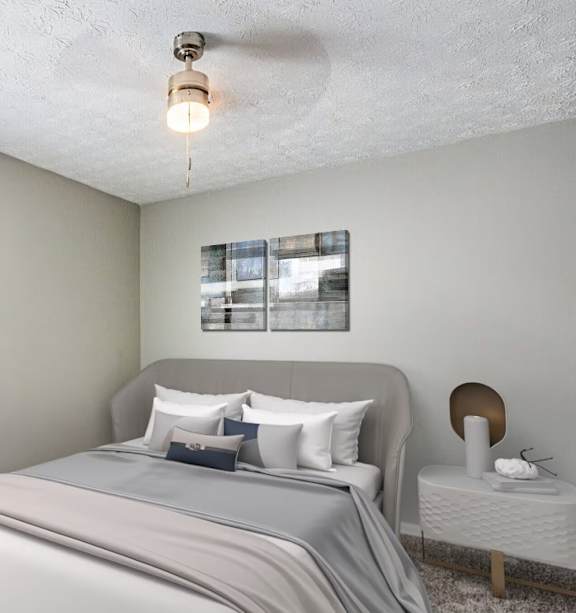 Bedroom with ceiling fan and large bed at Rivers at Bluegrass, Lexington, 40503