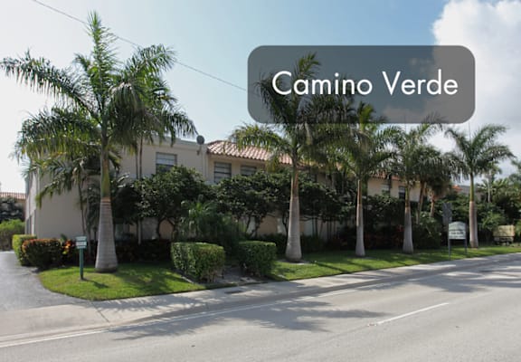 A street view with a sign that reads "Camino Verde".