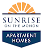 A logo for Sunrise on the Monon Apartment Homes.