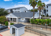 Thumbnail 10 of 13 - Exterior of the front of leasing office at Douglas Landing Apartment Homes, Texas