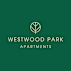 A logo with a tree and the words Westwood Park Apartments.