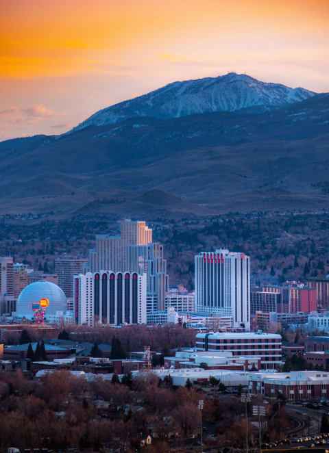 city of reno with mountain background