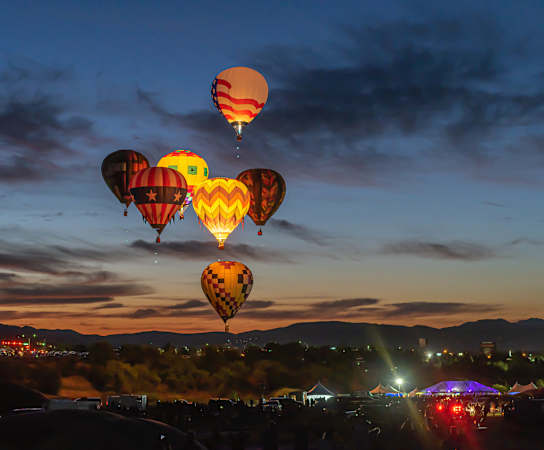 hot air balloons in the sky at dusk at 2300 West Apartments, Nevada, 89502