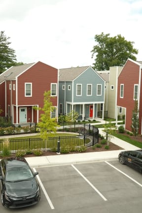 a row of houses in a parking lot