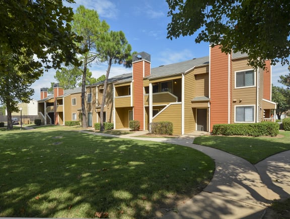 Exterior Patios and Balconies Overlooking the Lush Grass