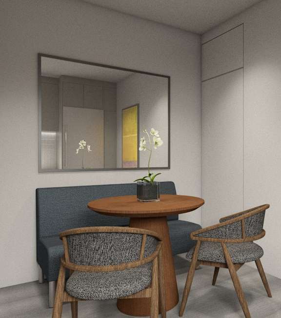 A small table with two chairs and a painting on the wall.
