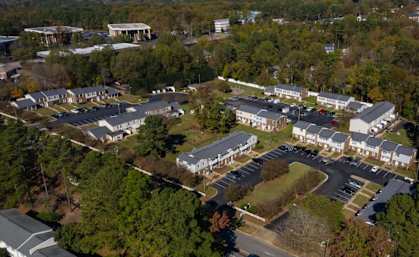an aerial view of a city with houses and trees at Colony Townhomes, Raleigh, NC, 27609