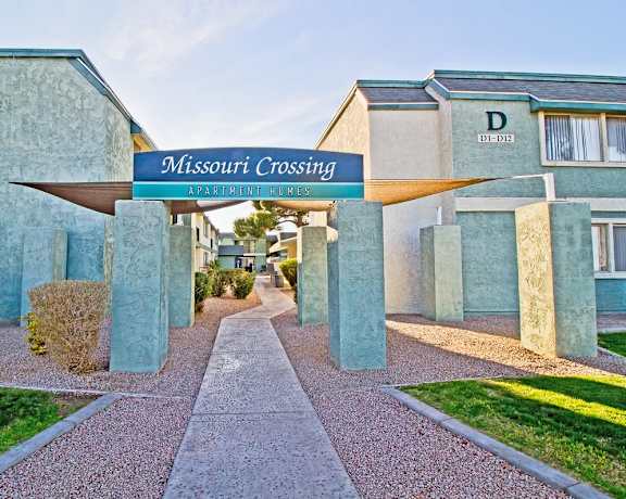 The entrance to the Missouri Crossing Apartments is shown.