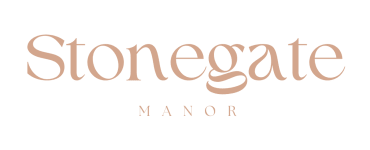 a black and white logo for stonegate manor