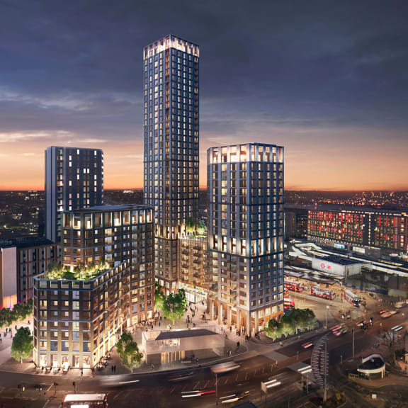 a rendering of a tall skyscraper in front of a sunset