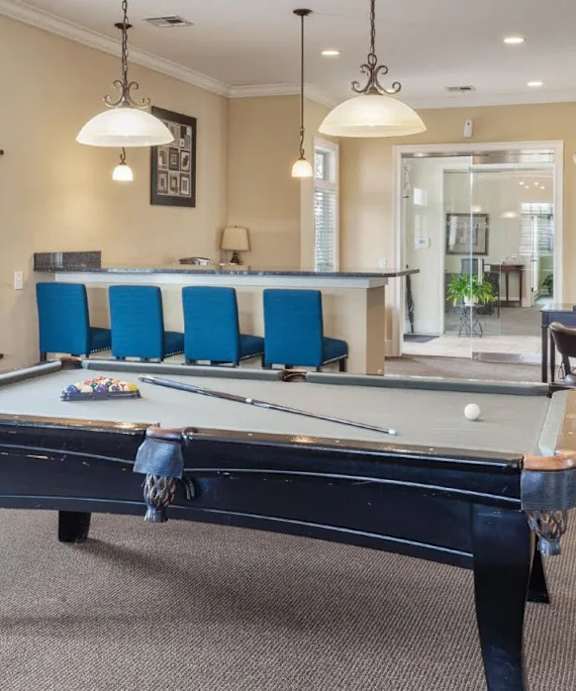 a dining room with a table and chairs at Uphill Flats, Decatur, GA, 30032