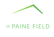A logo with a house shape and the words "OVATION at PAINE FIELD" in white.
