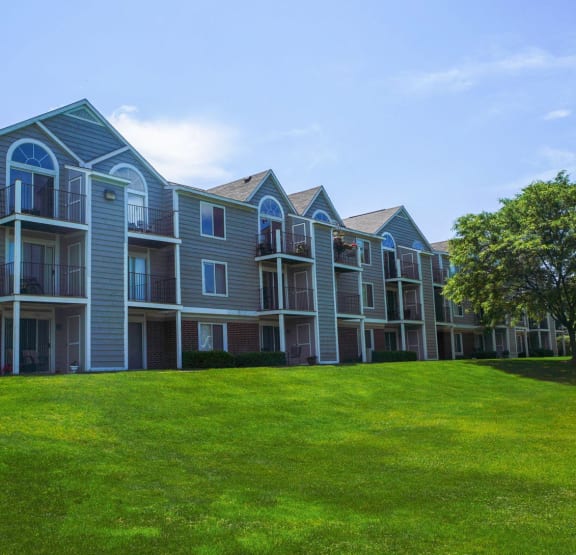 Exterior View of Apartment Balconies and Patio at Foxwood and The Hermitage, Portage, Michigan, 49024